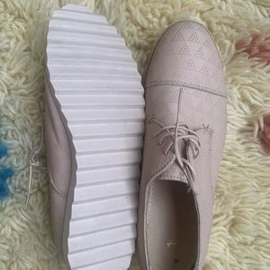 Stuka brand brogue style loafer size 9.5 new without tags.